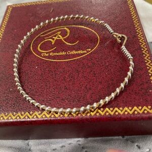 Ronaldo Jewelry Forever Fellowhip™ Gold and silver wire intertwined.